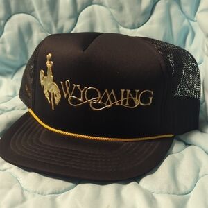 Black and Gold Wyoming Trucker Hat